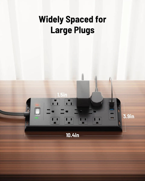 Heavy Duty Surge Protector Power Strip With Twelve AC Outlets Dual USB C Fast Charging, widely spaced plug design on a desk.