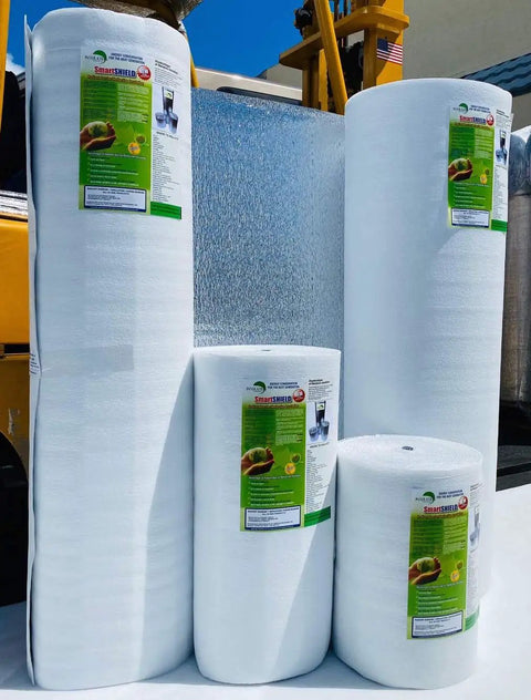 Heavy Duty Three Millimeter Foam Core Radiant Barrier Roll blocks summer heat, featuring four rolls with white vinyl surfaces.