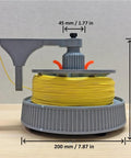 Slick Tangle Free Cable Dispenser, Desktop Wire Spool Reel Stand Featuring Dual Bearing Rotation For Smooth Horizontal And Vertical Cord Feeding, Totally Hassle Free Setup with yellow wire.