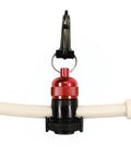 Red Magnetic Regulator Octopus Hose Holder Clip For Scuba Diving Gear shown holding a white hose, featuring durable black clip