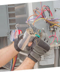 Heavy Duty Insulated Wire Strippers Pro Grade Electrical Pliers cutting wires in a hand while working on HVAC system.