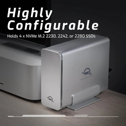 Tough Aluminum Four Slot Nvme M.2 Ssd Enclosure With Blazing Usb4 Kick Thunderbolt Sync And Optimized SoftRAID Config Built For Epic Hot Swap Storage Rigs On Mac Or Windows Pc next to a desktop.