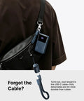 Throw This Compact 10000 Mah Power Bank In Your Pocket For Immediate Relief Packs 45W Usb C Pd Fast Charge For Phones Consoles And Laptops, shown attached to a bag.