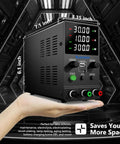 Pro-Grade DC Power Supply 0-32V 0-10A, Adjustable Bench Regulated Switching Unit With Encoder Knob, shown on a hand in server room.
