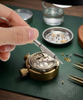 3 In 1 Eyewear Screwdriver Repair Kit with 10 stainless steel mini screwdrivers used to repair a wristwatch mechanism