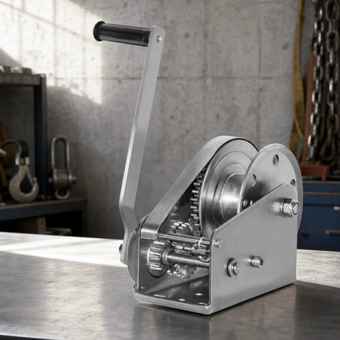 Tough As Nails 304 Stainless Steel Manual Winch Hoist Crank with Heavy Duty Gears shown in detail on a workbench.