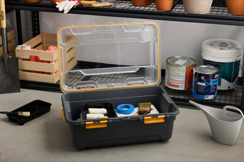 Heavy Duty IP68 Waterproof Plastic Storage Tote Featuring Tough As Nails Gasket Seal And Secure Latches Rugged Gray Bin open with tools inside.