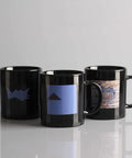 Three black mugs with custom designs using Water Slide Decal Paper For Inkjet Printers Clear US Letter Size 8.5 By 11 20 Sheets.