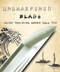 Close-up of unsharpened blade tip of stainless steel wakizashi iaito for iaido training, with wave artwork in background.