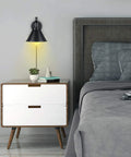 2 In 1 Plug In Or Hardwired Swing Arm Wall Light Sconce In Industrial Black Finish with Adjustable Arm above nightstand