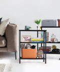 Real Deal Three Tier Rolling Cart With Smooth Ride Wheels For Kitchen Microwave Storage And Flexible Home Organization in living room with items.