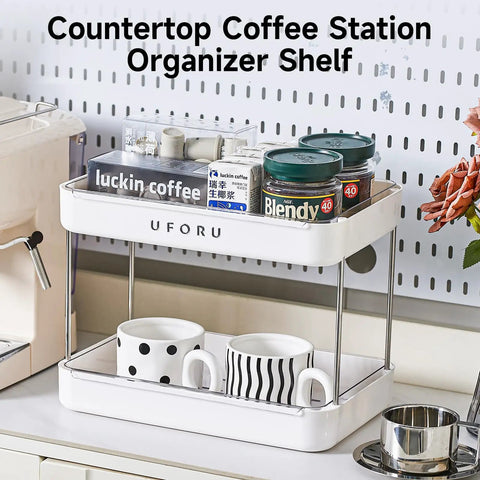 Coffee Bar Organizer Station With 2 Tier Mug Rack And Removable Drain Tray on kitchen countertop with mugs and coffee pods.