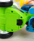 360 Degree Electric Stunt Tricycle Toy With LED Lights And Music, green underside with battery compartment and wheels