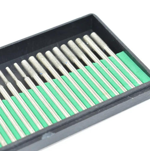 Close-up of 60 Piece Diamond Drill Bit Set For Jewelry Making And Lapidary, 1mm 2mm And 3mm Mix With One Eighth Inch Shanks in black tray
