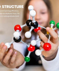 Student using the 135-Piece Organic Chemistry Model Kit For Students And Teachers Portable Molecular Modeling Set For Chemistry Classes.