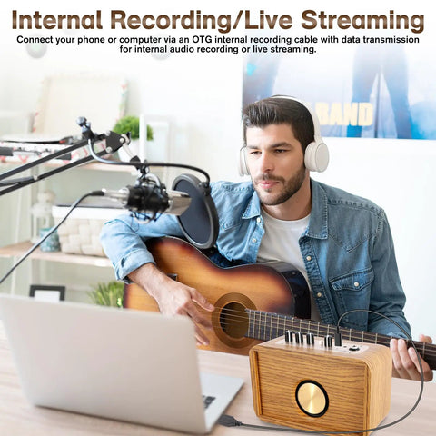 Man using 10W Mini Guitar Amp With Clean And Drive Channels while live streaming with microphone and laptop