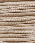 Close-up of Solid Braid Cotton Sash Cord three eighths inch by 250 feet natural color, weather resistant multipurpose clothesline.