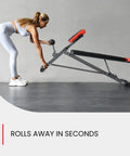 Woman folding All In One Adjustable Weight Bench For Full Body Home Gym Workouts With Bench Press Back Extension Roman Chair Sit Ups Core And Glute Training For Real Gains Heavy Duty Frame Smooth Adjustments And Sturdy Support