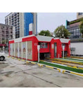 Heavy Duty Full Auto Car Wash Machine Non Contact High Pressure Cleaner With Air Dryer at a gas station with multiple wash bays.