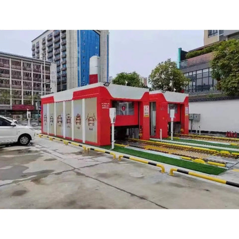 Heavy Duty Full Auto Car Wash Machine Non Contact High Pressure Cleaner With Air Dryer at a gas station with multiple wash bays.