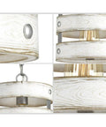 Close-up of coastal farmhouse pendant light dope with galvanized finish and open cage frame showing whitewashed bands.