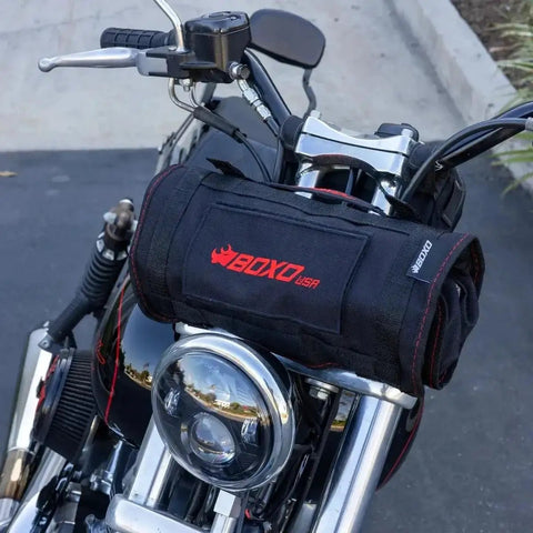 Ride Ready 48 Piece Motorcycle Tool Kit in a compact roll up mounted on a Harley Davidson front handlebar for quick roadside fixes