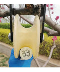 No Sweat U Groove Sliding Gate Caster Wheel With Thick Nylon Roller and Heavy Duty Double Bearing Steel Guide Track For Smooth Garage Door Pull On Any DIY Home Job mounted on a branch.