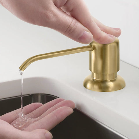 Brushed Brass Multi Purpose Kitchen Soap And Lotion Dispenser With Self Priming Pump in use, dispensing liquid into hand
