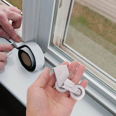 Four Piece Heavy Duty Aluminum Pulley Rollers For Smooth Sliding Doors And Windows Straight Up Quick Swap Garage Track Replacement Hardware in hand.
