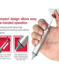 Manual Desoldering Pump Solder Sucker Tool with Anti Clogging Silicone Tip shown in hand, highlighting compact aluminum design.