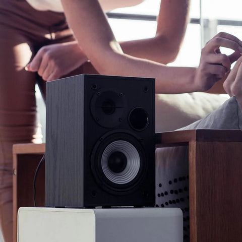 4 Inch Active Bookshelf Speakers With 24W RMS Front Ported Desktop Studio Monitor For Computer Use, classic wood finish, in room.