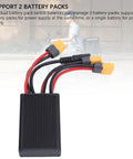 Heavy Duty Dual Battery Pack Balance Discharger With Snap Ready Charging Port And Steady 40A Output For 20V To 72V Boards Plus Smart Balancing Tech, showing black adapter with wires.