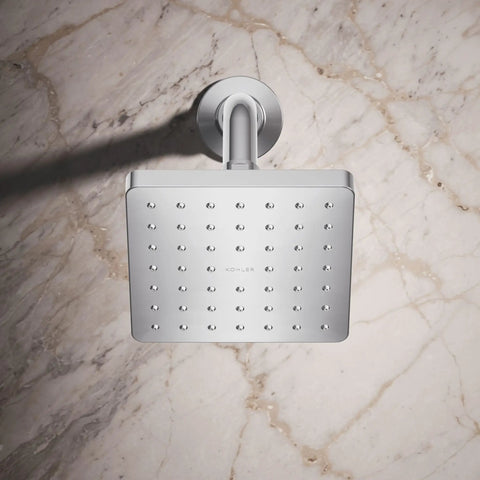 Overhead view of Parallel SF 2.5 GPM showerhead in polished chrome, single function, mounted on marble wall