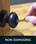 Lockout Key For Schlage Locks Exterior Door Lockout Tool being used on a black doorknob for quick privacy and outside locking