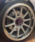 Close-up of a Heavy Duty Metal Brake Discs And Wheel Rim Kit For 1/10 On Road RC Cars, 12mm hex adapters, showing disc detail.