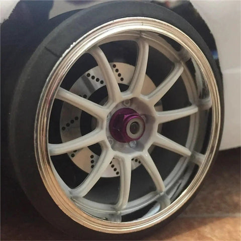 Close-up of a Heavy Duty Metal Brake Discs And Wheel Rim Kit For 1/10 On Road RC Cars, 12mm hex adapters, showing disc detail.