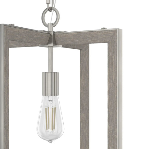 Close-up of Woodburn One Light Pendant Light in brushed nickel, rectangle fixture with E26 bulb for clean modern home vibe.