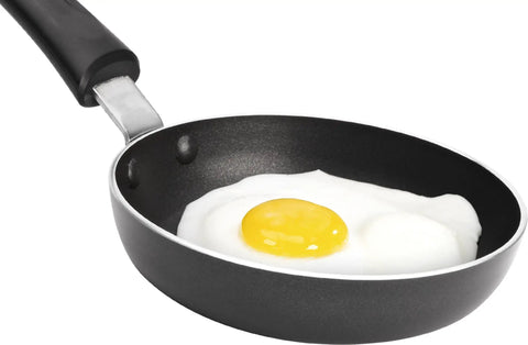Mini 4.6 Inch Nonstick Aluminum Fry Pan For Single Eggs And Tiny Servings with a fried egg, easy cleanup skillet.