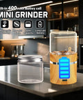 Compact Electric Herb Grinder With Dual 50ml Glass Jars 2in By 3.5in Portable Spice Grinder on kitchen counter