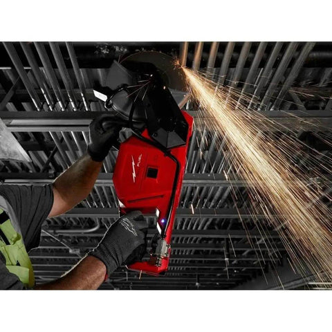 Badass 18V Cordless Power Cut Off Saw With Nine Inch Diamond And Abrasive Blades For Rugged Concrete And Rebar Tasks With Onboard Water Hookup And Slick Professional Ergonomics, operator using it on a construction site.