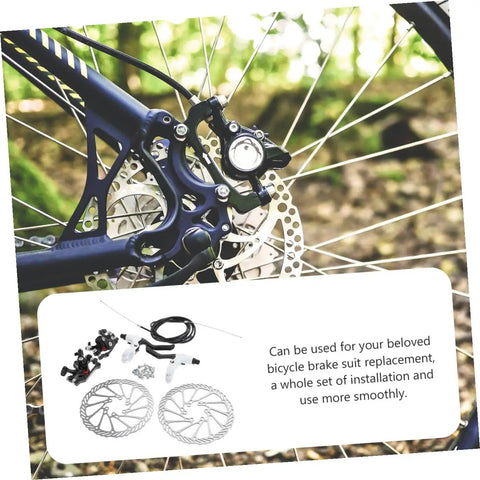Heavy Duty Mountain Bike Hydraulic Disc Brake Set With Slick Pad Compatibility and Killer Heat Management for Bulletproof Stopping Power on Gnarly Race and Trail Rip Runs, close-up of caliper and rotor.