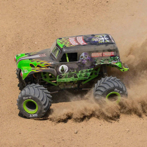 Grave Digger 1 To 18 Scale Mini LMT 4X4 RC Monster Truck RTR with green body, LED headlights, BKT tires on dirt track
