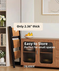 Three Step Ladder With Anti Slip Pedals, Folding Step Stool In Black And Woodgrain, Lightweight Aluminum Frame, Non Slip Feet For Stable Climb, Easy Open Fold, Built To Last For Home, Garage, And DIY Projects. Folded beside cabinet, 2.36-inch thick