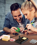 Two people using 100W LED Digital Soldering Iron Kit With Ceramic Heater, Quick 15 Second Heat Up, showing solder wire and tips.