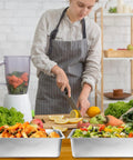 Chef preparing salad with Four Pack Full Size 6 Inch Deep Steam Table Pans Stainless Steel Serving Trays for Food Service Hotels Buffets