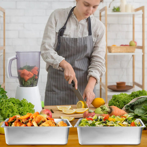 Chef preparing salad with Four Pack Full Size 6 Inch Deep Steam Table Pans Stainless Steel Serving Trays for Food Service Hotels Buffets