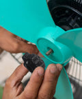 Person installing M8 Black Star Hand Knobs 32Mm Through Hole Brass Insert Screw On Clamping Handles 4 Pack on a machine.