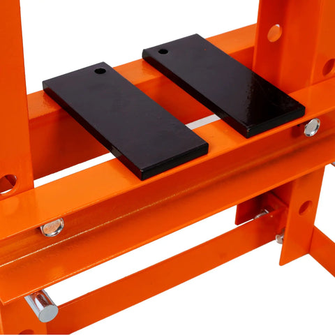 Garage Beast Six Ton Hydraulic Press With Adjustable Plates And Reliable Safety Valve Orange Benchtop Power Tool showing black adjustable plates.
