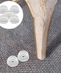Silicone Anti Slip Furniture Pads For Couch And Chair Legs Soft Yet Durable Rubber Feet Protectors shown with chair leg on carpet.