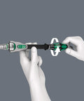 Hands demonstrating the spin sleeve function on the Zyklop 6 In 1 Metric Speed Ratchet Set With 28 Piece Kit And One Quarter Inch Drive.